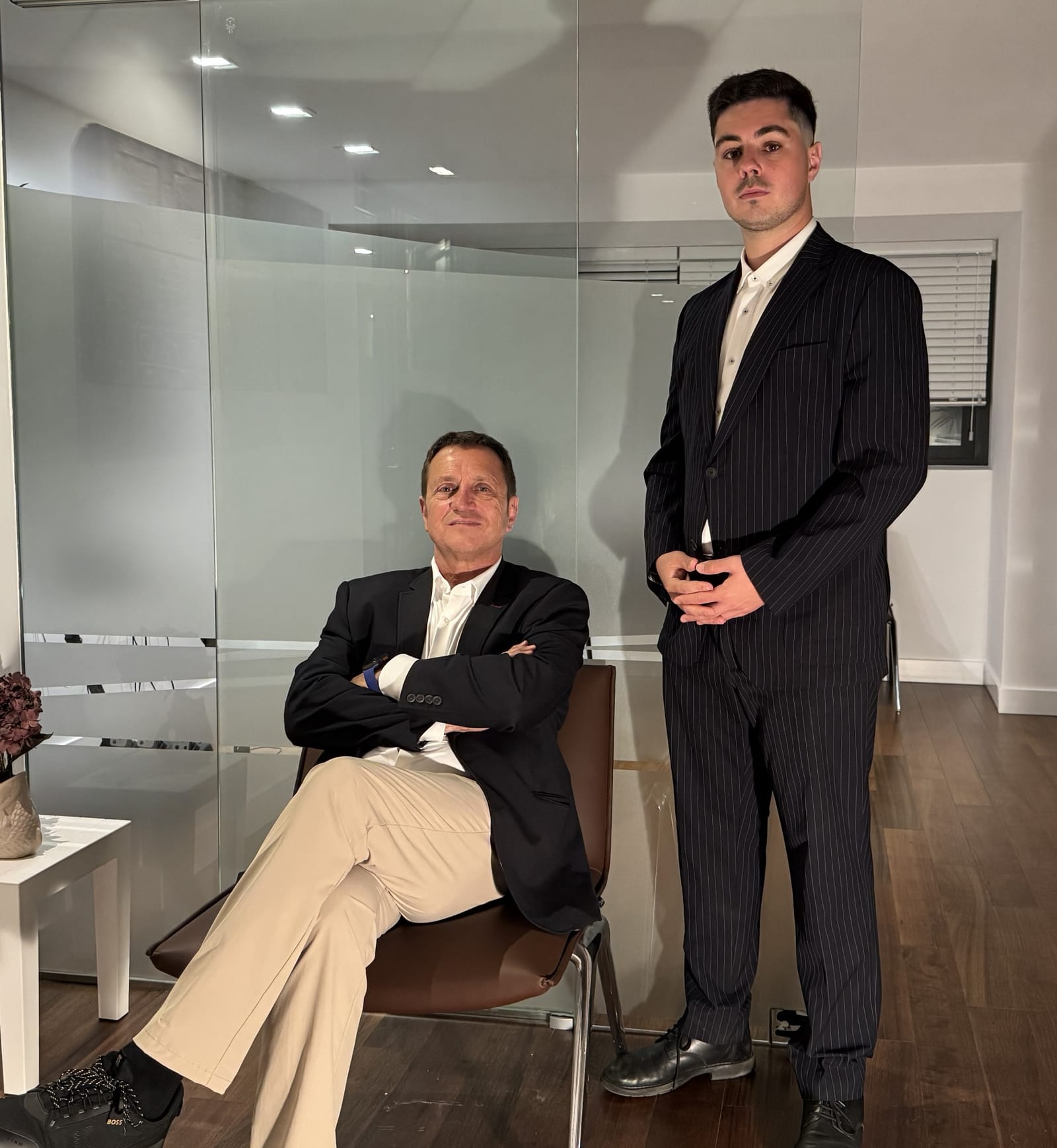 Juan Bertomeu with a member of the Expat Abogados team at the office